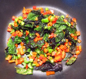 add chopped sweet red pepper to the pan